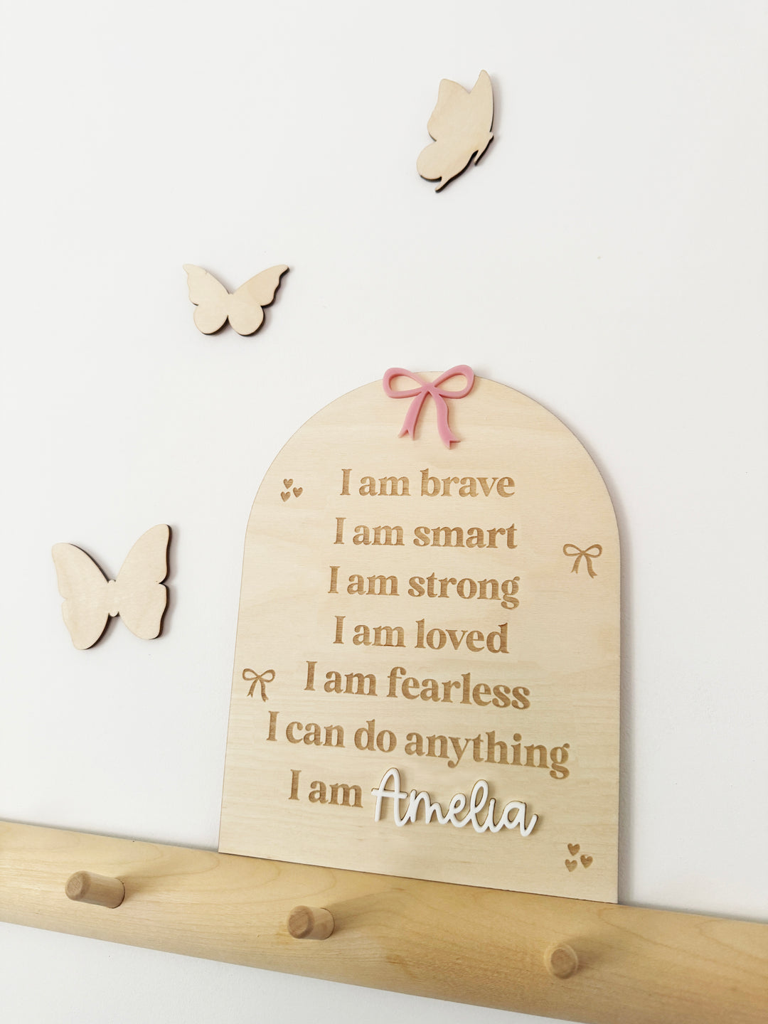 Personalised bow affirmation arch