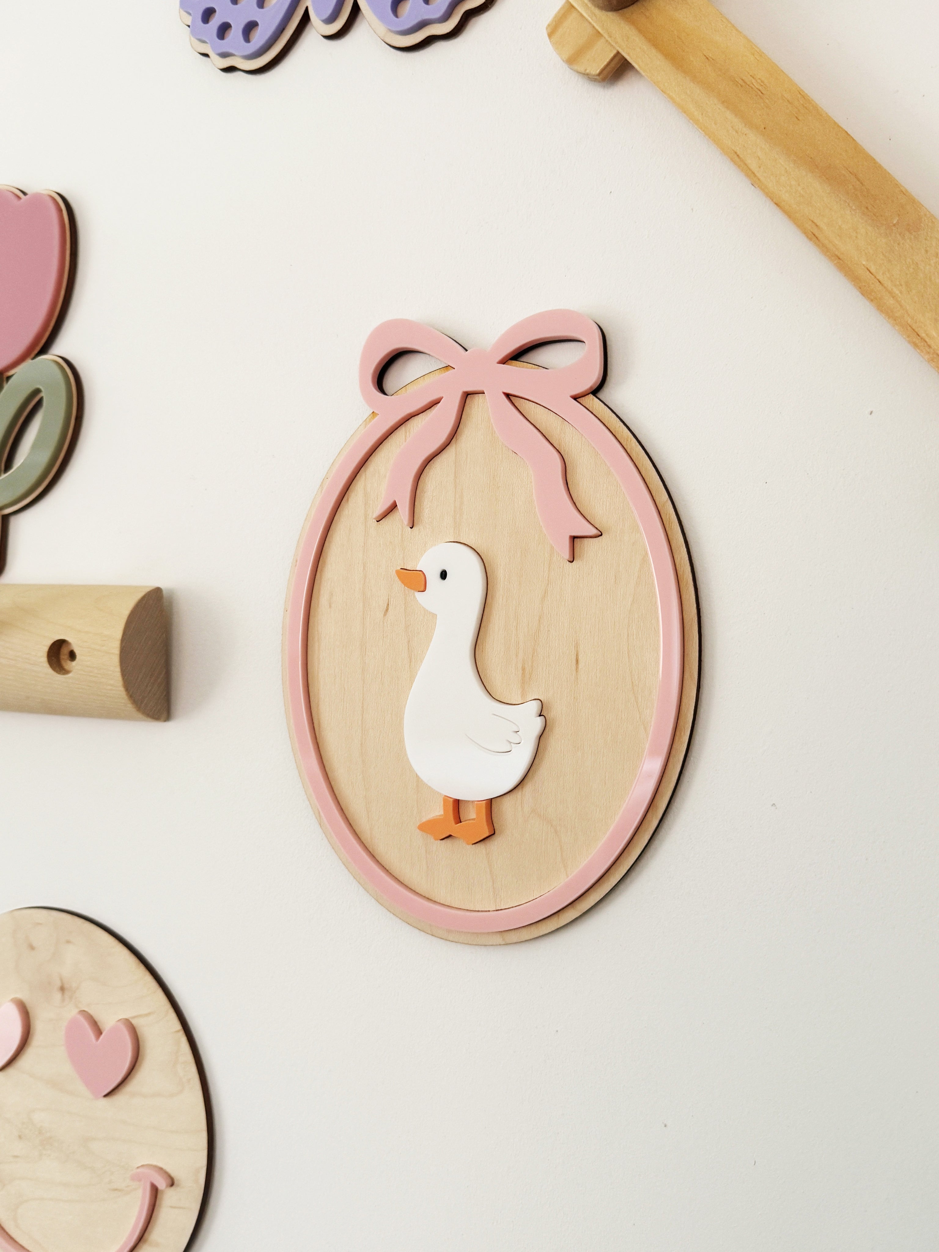 Goose bow oval wall plaque