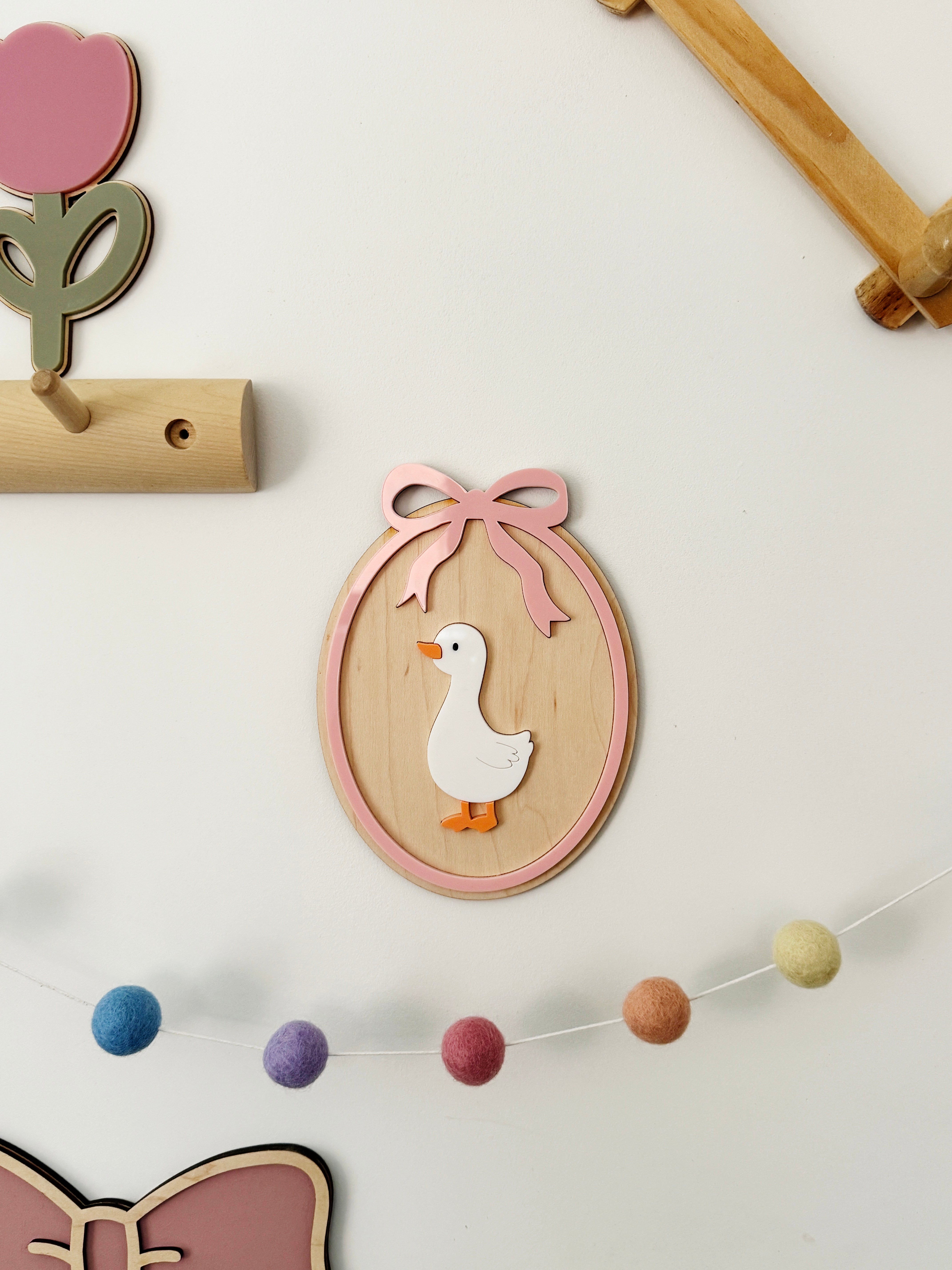 Goose bow oval wall plaque