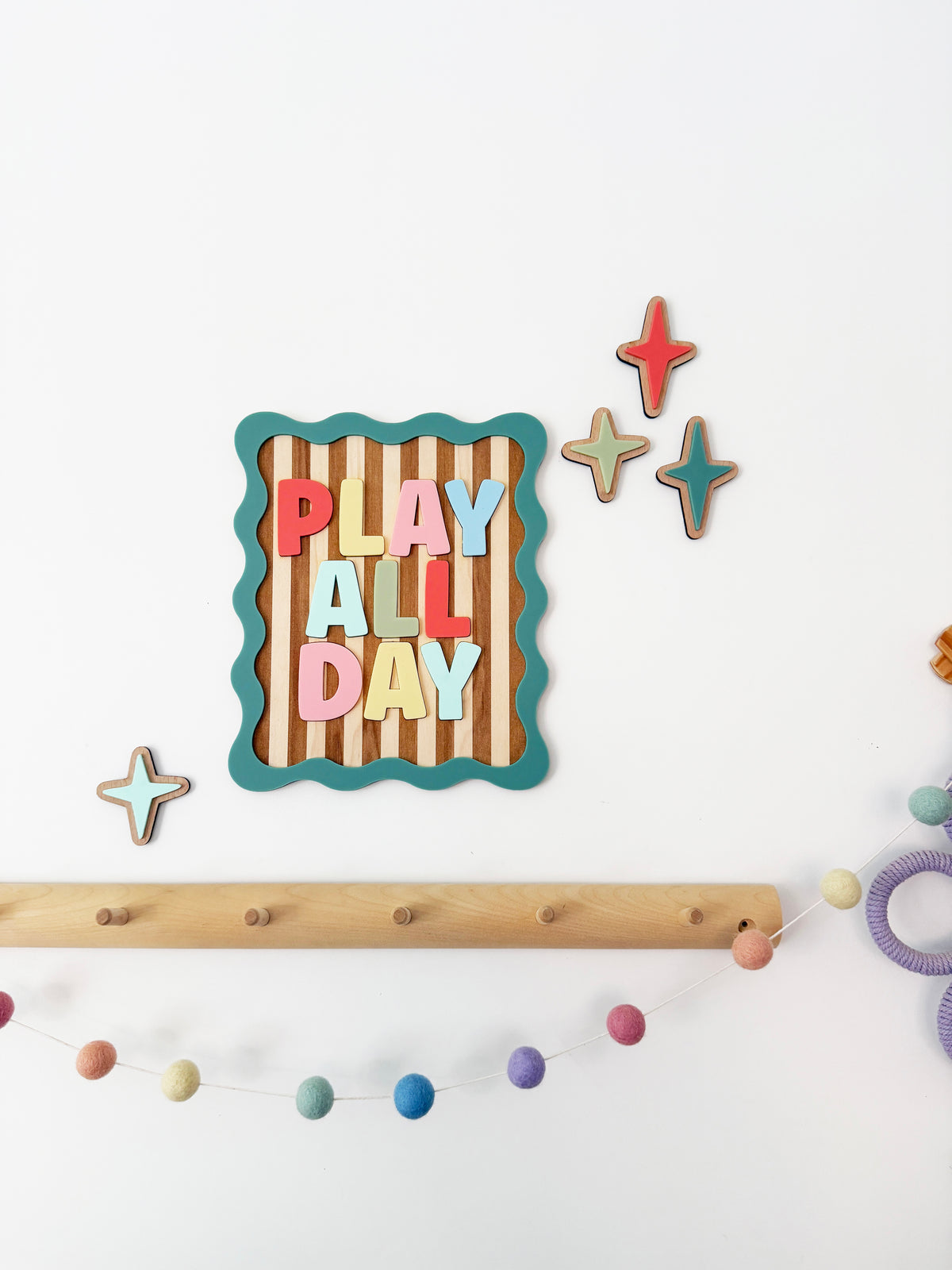 Play all day stripe squiggle wall sign