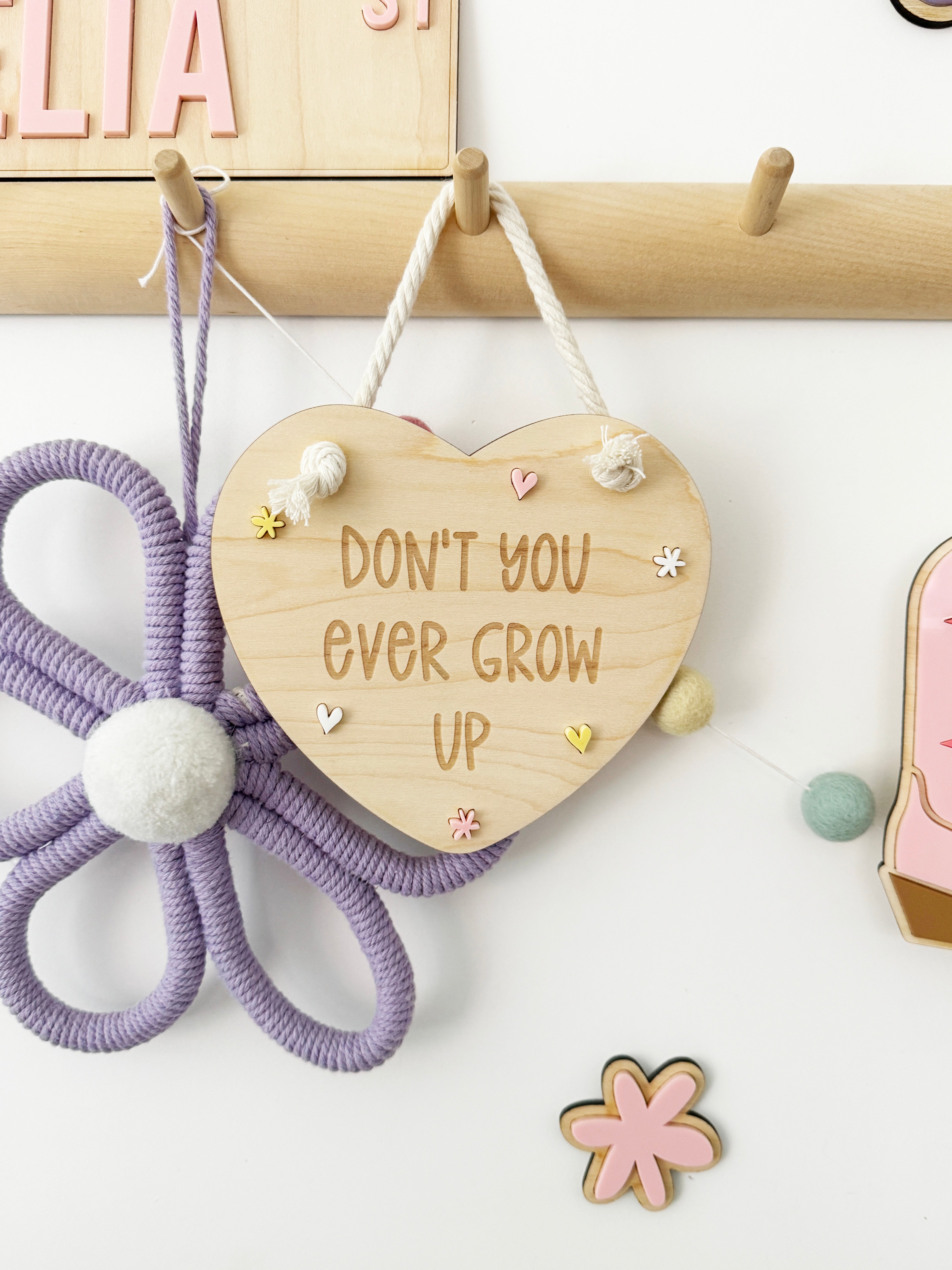 Don’t you ever grow up heart hanging