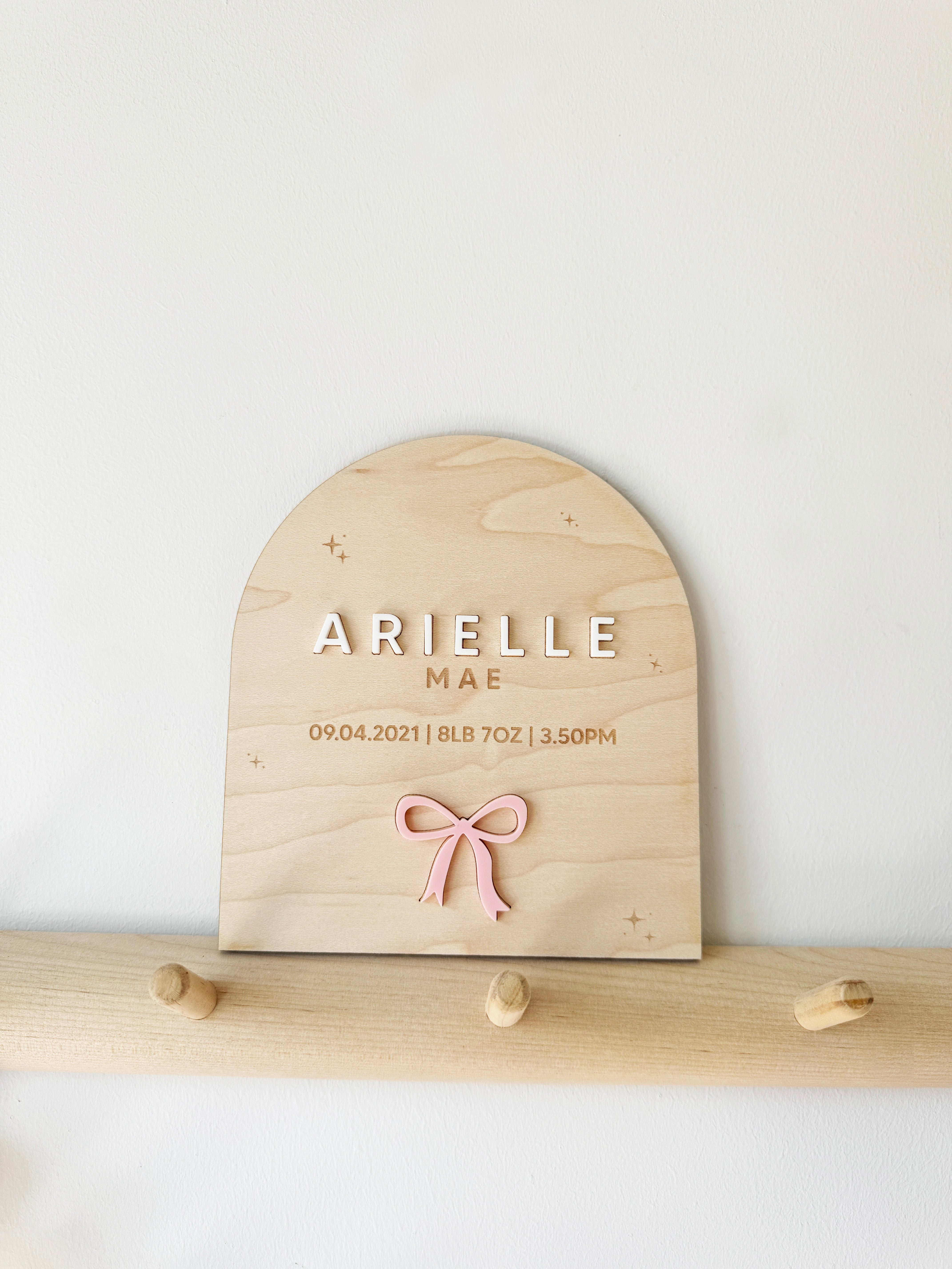 Personalised bow baby name announcement arch