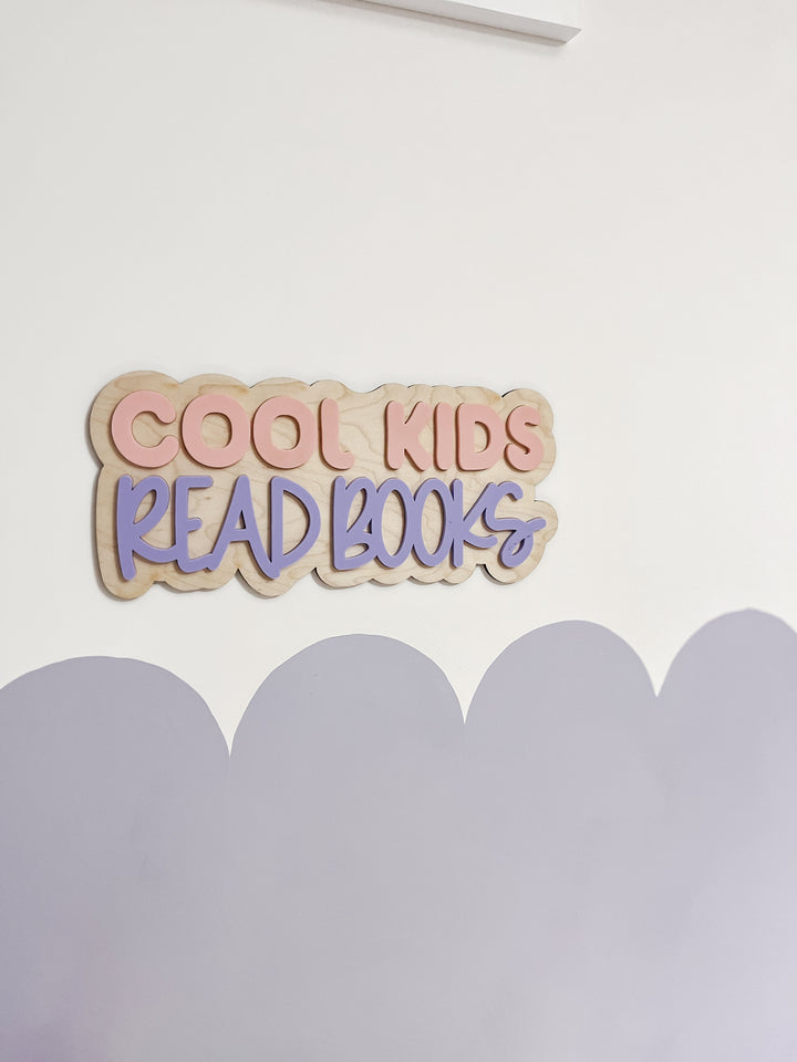 Cool kids read books wall sign