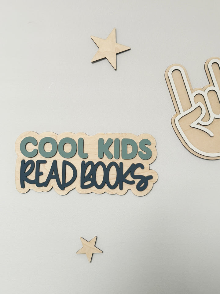 Cool kids read books wall sign
