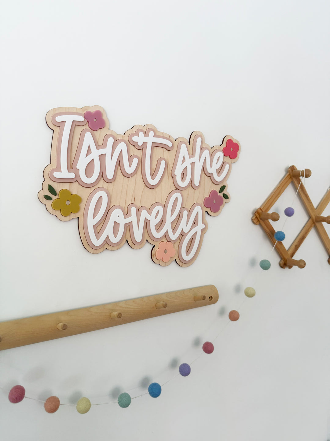 Isn't she lovely floral wall sign