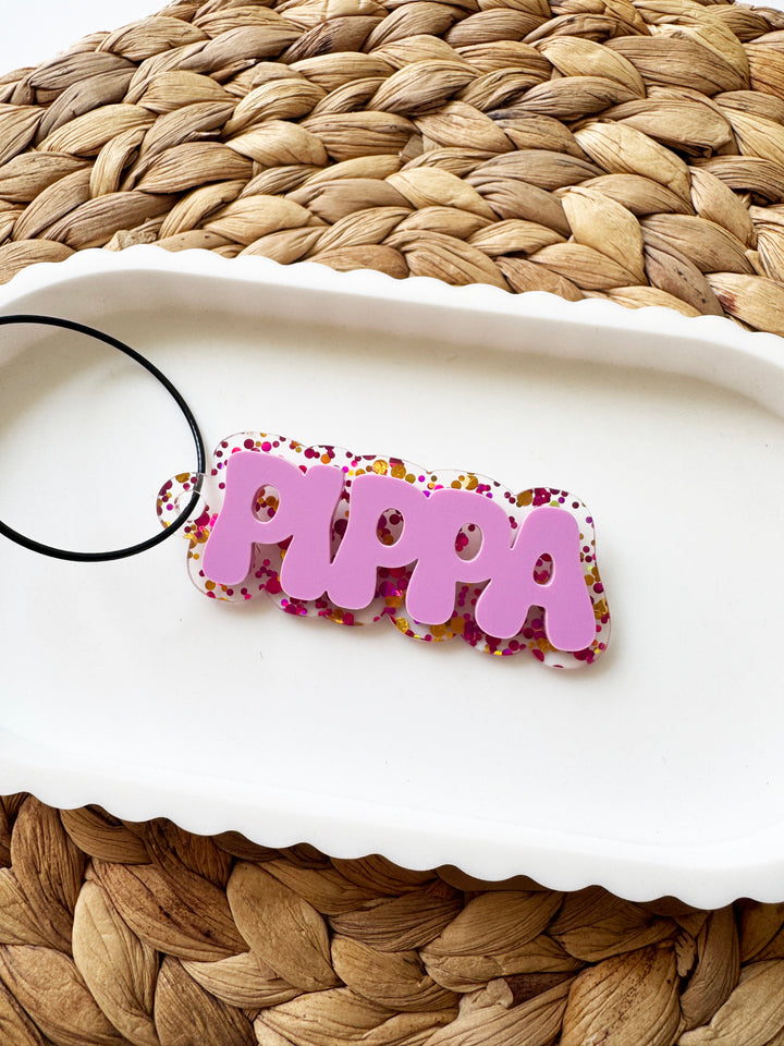 Personalised pink glitter bag tag